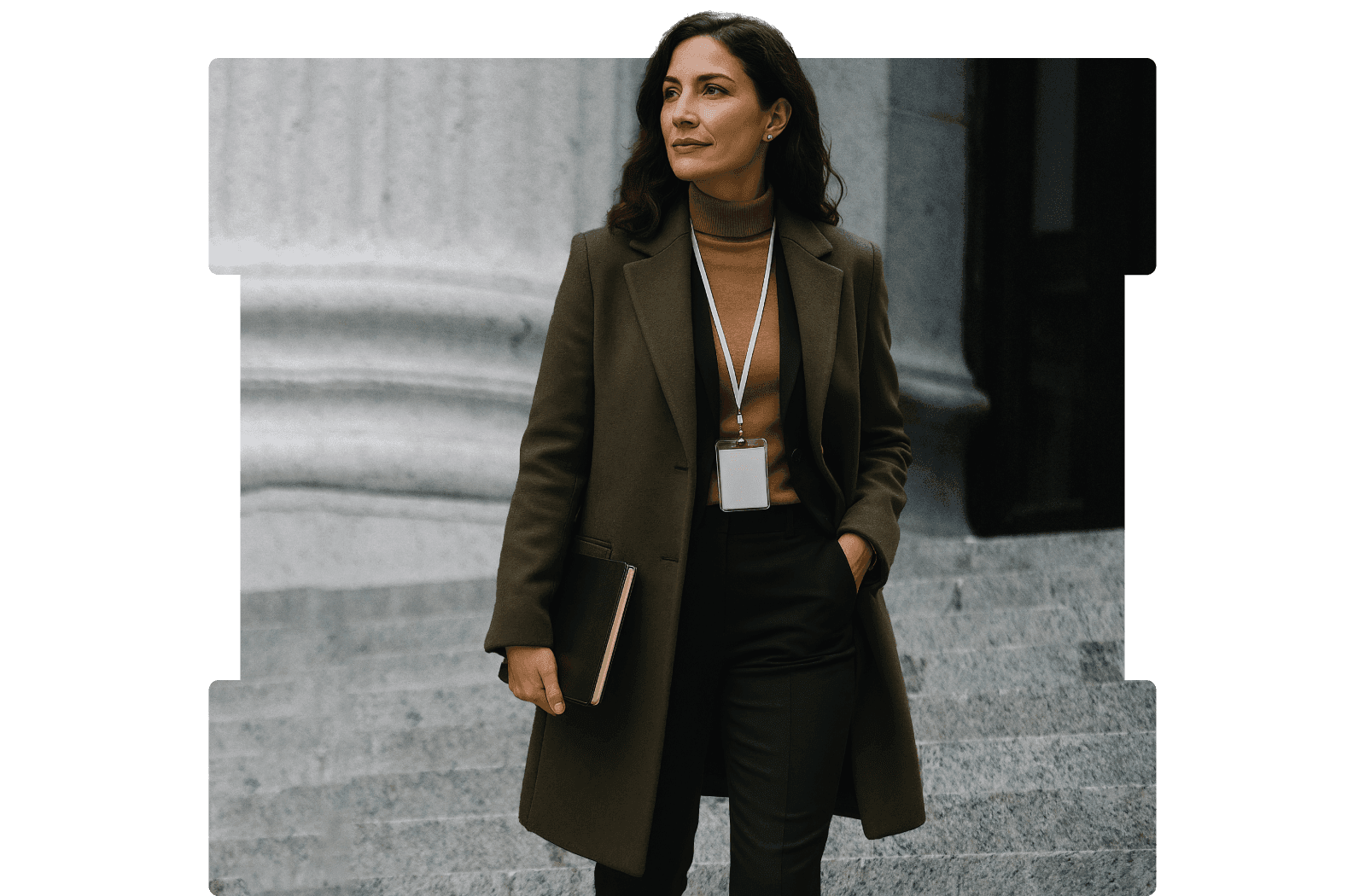 Confident businesswoman in a brown coat standing on stone steps, holding a book and wearing a lanyard, with an architectural column background partially masked by a rectangular frame with cut-out edges.